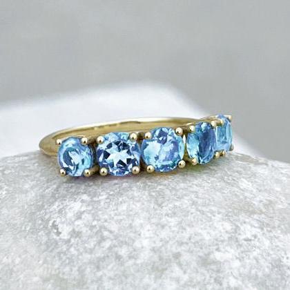 Solid Gold Engagement Ring With Blue Topaz,..