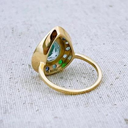 Engagement solid gold ring with pea..