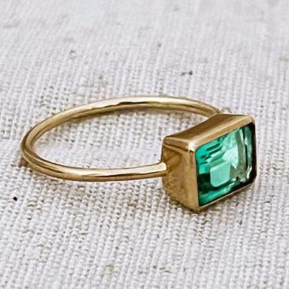 Engagement solid gold ring with gre..
