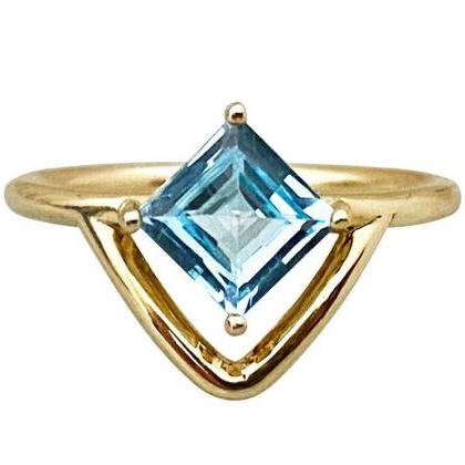 Solid Gold Engagement Ring With Princess Cut Blue..