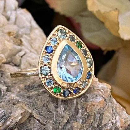 Engagement Solid Gold Ring And Pear Shape Blue..