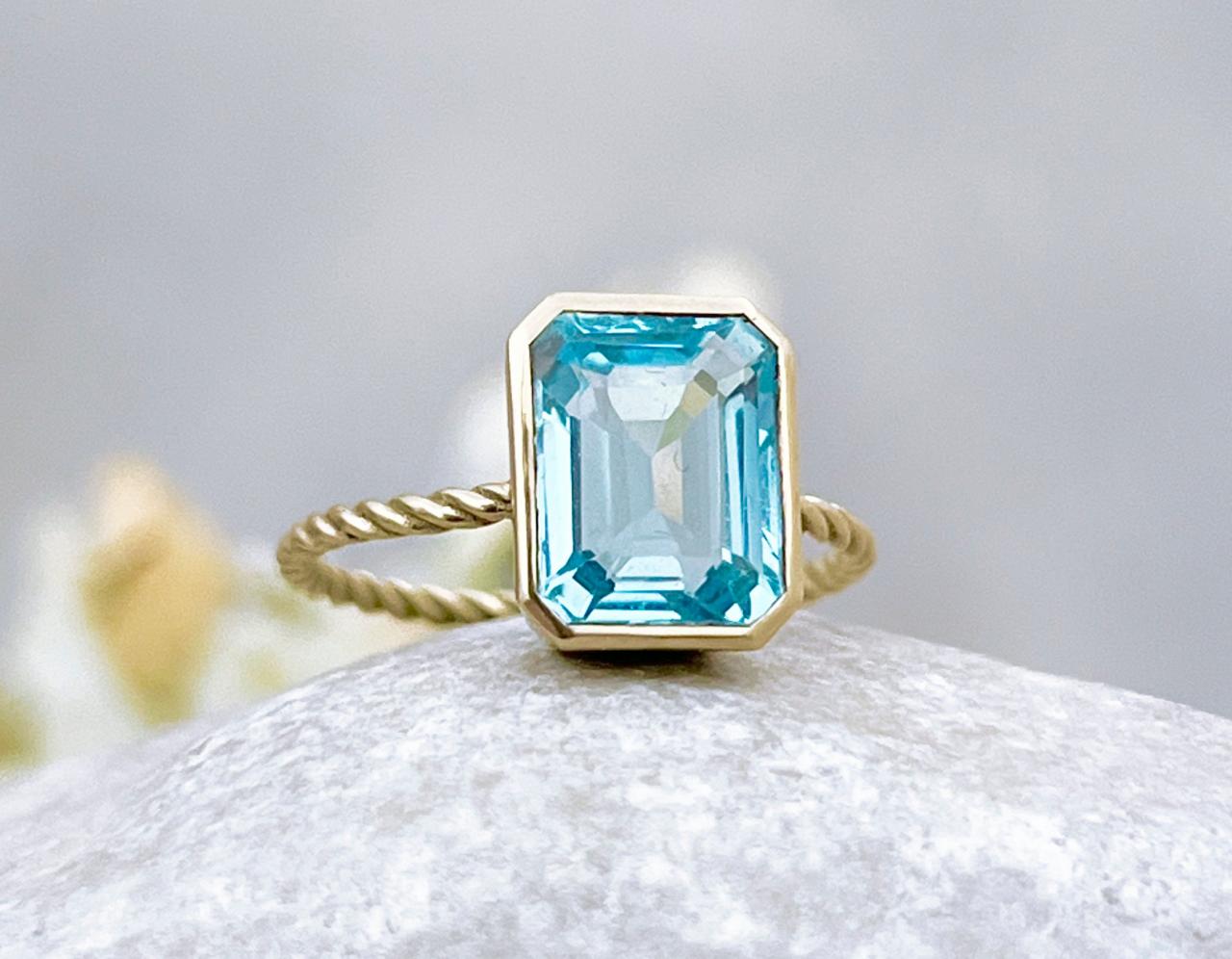 Solid Gold Solitaire Engagement Ring With Emerald Cut Blue Topaz, 18k Modern Style Twist Ring, Natural Light Blue Stone Proposal Ring