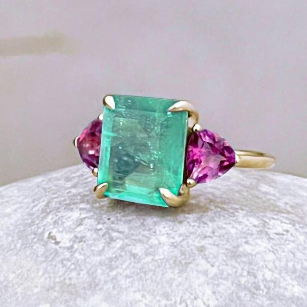 Solid Gold Solitaire Engagement Ring With Emerald Cut Blue Topaz, 18k